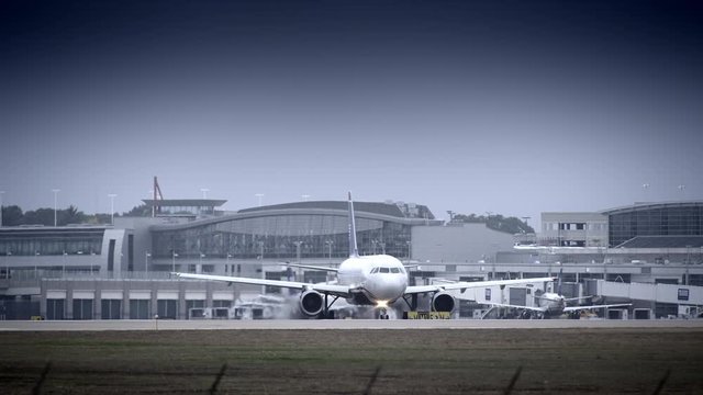 Wide Shot Of Commercial Airplane On Runway