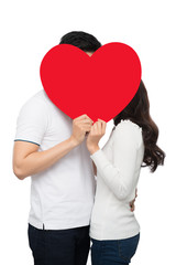 Boyfriend and girlfriend kissing with happy face expression look