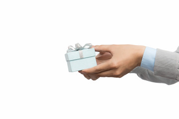 male hand giving a gift, over white background