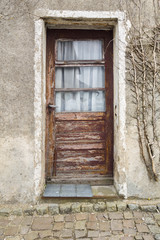 Wooden door of an ancient house