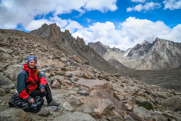 Trekker resting on trail