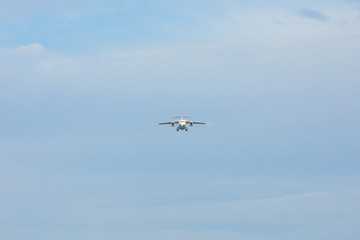 Bottom view airplane takeoff to the sky. the rise of the real aircraft in the sky.