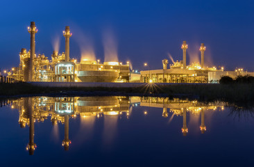 Reflection of Gas turbine power plant with blue hour