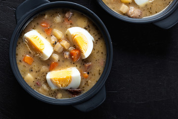 The sour soup made of rye flour with eggs