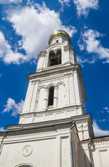 Fototapeta na wymiar Bell tower of St. Nicholas Church in the village of Rogachevo, Moscow region