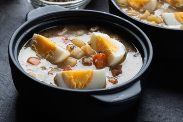 The sour soup made of rye flour with eggs