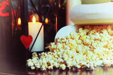 popcorn basket near candle