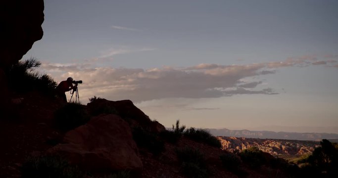 Silhouette of photographer photographing in Arches National Park