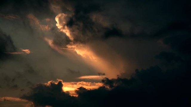 View of dark cloudscape during sunset