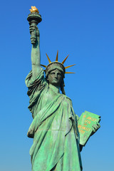 Statue of Liberty on blue sky