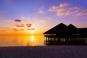 Water cafe at sunset - Maldives