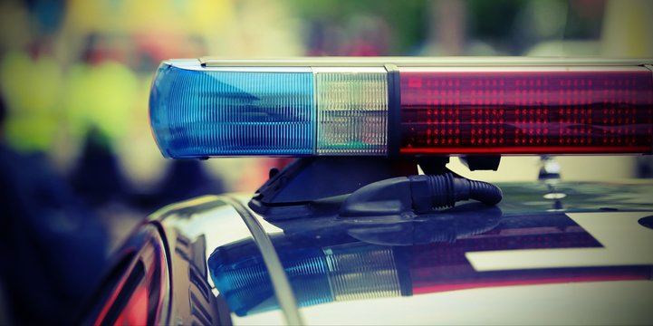 Red And Blue Flashing Lights Of The Police Car At The Checkpoint