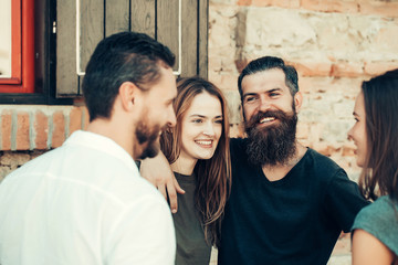 smilling couple with friends