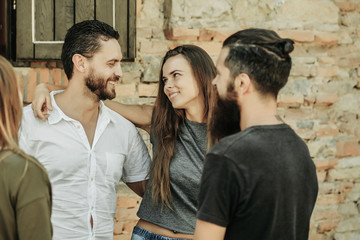 smilling couple with friends