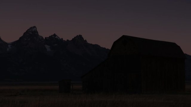 Night to day timelapse of Mormon Row in in Grand Teton National Park