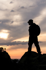 Silhouettes of the climber at sunset.Sport and active life.