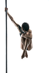 Female pole dancer with body-art on pylon