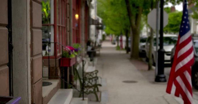 View of empty sidewalk in town