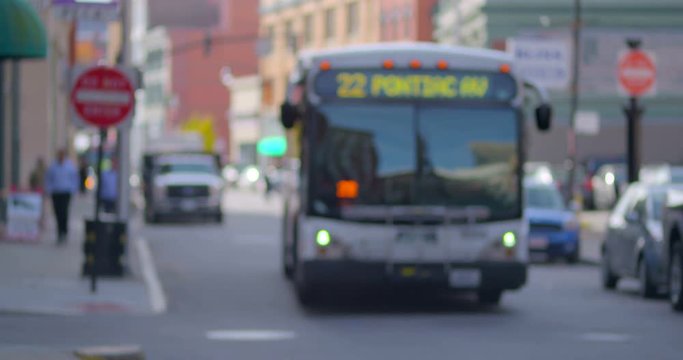 Soft focus of vehicles moving on the city street