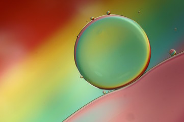 Oil drops on a water surface - abstract rainbow colored macro (510)