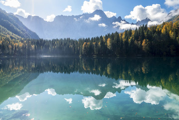 Beautiful mountain lake in autumn, laghi di fusine, italy