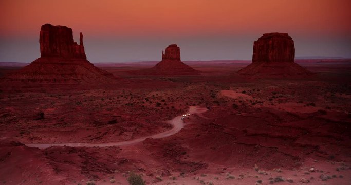 Wide shot of monument valley at sunset