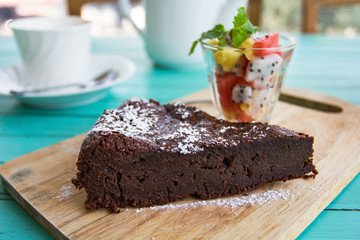 Chocolate cake with fruits salad