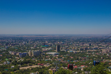 Fototapeta na wymiar Cabin of cable car at Almaty city view, Kazakhstan