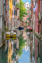 Fototapeta na wymiar Colors reflecting in Venice Canal, Italy