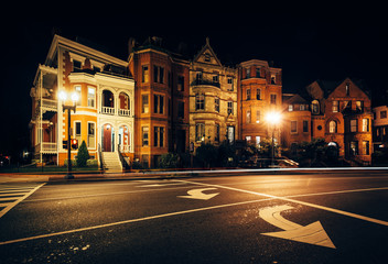 Fototapeta na wymiar Long exposure of traffic and historic houses at Logan Circle at