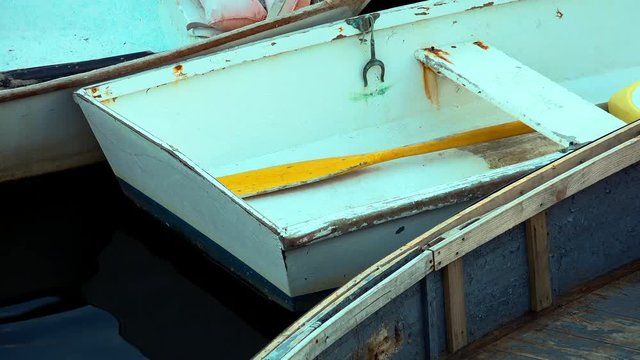 Close up of rowboat floating in water