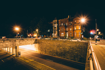 Rowhouses and the K Street Underpass at night, at Washington Cir