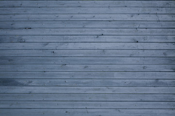 Dark blue natural wood background.