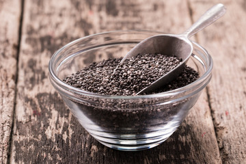 Chia seeds on wood background. Chia seeds protect heart,superfood. Healthy food