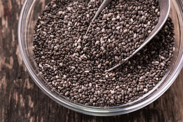 Chia seeds on wood background. Chia seeds protect heart,superfood. Healthy food