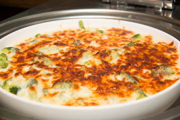  bowl of freshly cooked pasta bake  on buffet