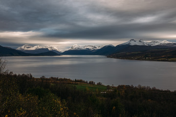 Scenery near Senja - Norway, Scandinavia, Europe. Beautiful fjord and coast. Incredible clouds. Sogn district.