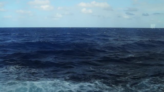 Open ocean steadicam pan, shot from a cruise ship.