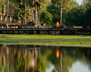 Buddhist monk at Angkor Thom temple. Angkor Wat complex, Siem Reap, Cambodia travel destinations