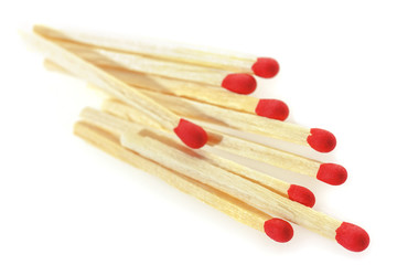 Matchsticks on a white background.
Soft focus view.