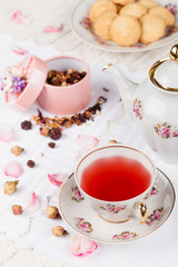 Obraz na płótnie Canvas cup of red tea on serving table