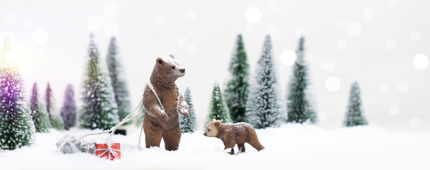 Christmas polar and grizzly bears in Snowy Winter Forest - Christmas trees
