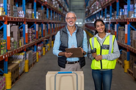 Portrait of warehouse workers working together