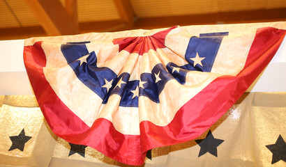 Circular American flag in great shape rosette hanging