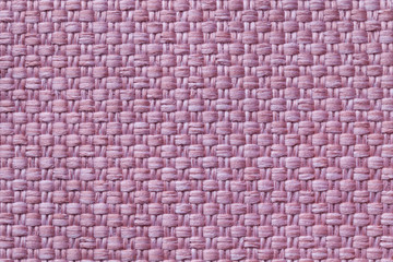 Light purple textile background with checkered pattern, closeup. Structure of the fabric macro.
