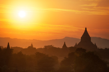 Amazing sunset colors and silhouettes of ancient Buddhist Temples at Bagan Kingdom, Myanmar (Burma). Travel landscape and destinations