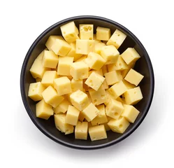 Gordijnen Bowl of diced cheese squares from above © bigacis