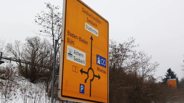 Autobahn highway in winter, Autobahn signage in Germany.