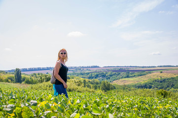 Fototapeta premium Tourists in the lush greenery of the day