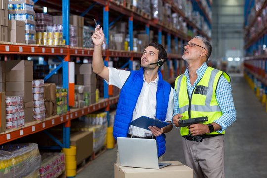 Warehouse workers interacting with each other
